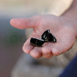 Load image into Gallery viewer, Black Shungite stones held in hand