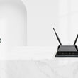 Load image into Gallery viewer, Charging plate with router on white surface.