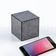 Load image into Gallery viewer, Cube speaker next to iPhone