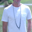 Load image into Gallery viewer, Man in white tee shirt with mala beads - DSC_0939copy