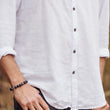 Load image into Gallery viewer, Man in white shirt wearing bracelet, MG_9215DZI