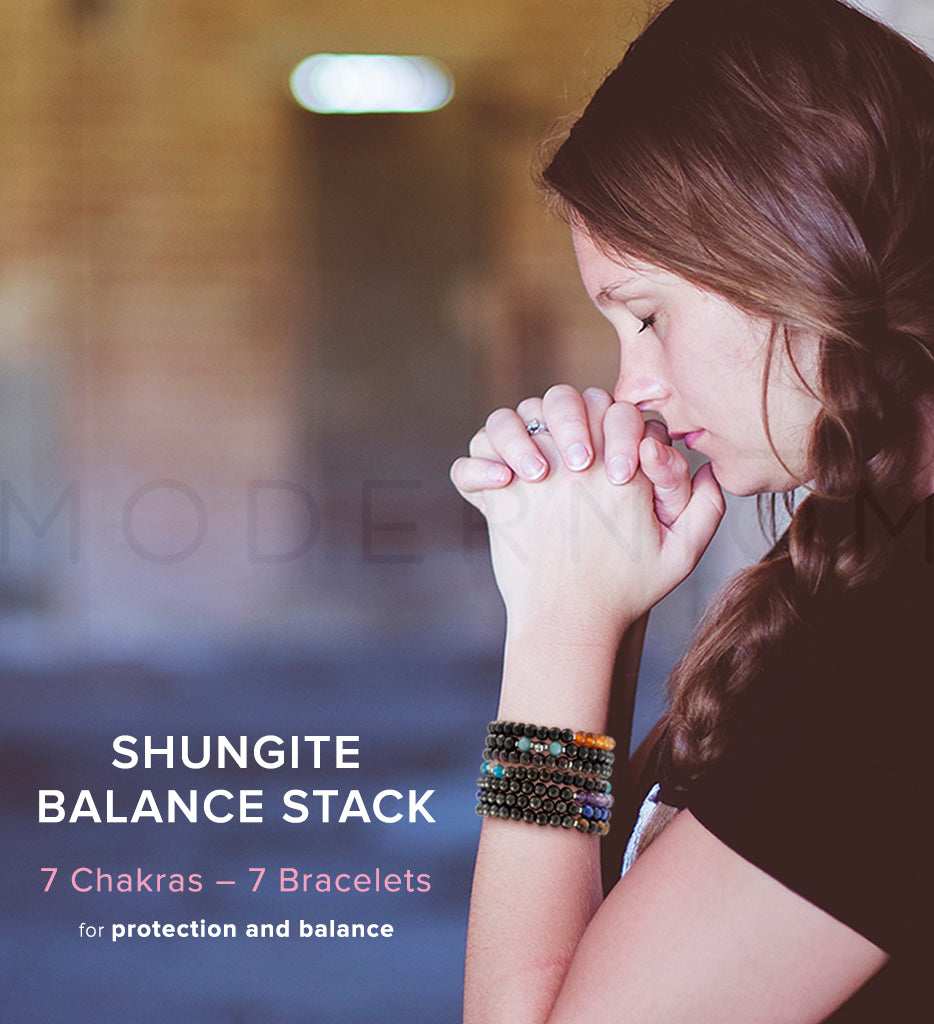 Shungite Balance Stack bracelets on woman, for chakra protection.
