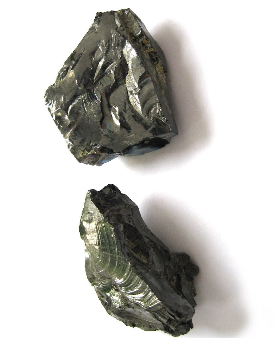 Two polished obsidian rocks