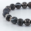 Load image into Gallery viewer, shungite, black sardonyx, striped dzi bead bracelet - detail