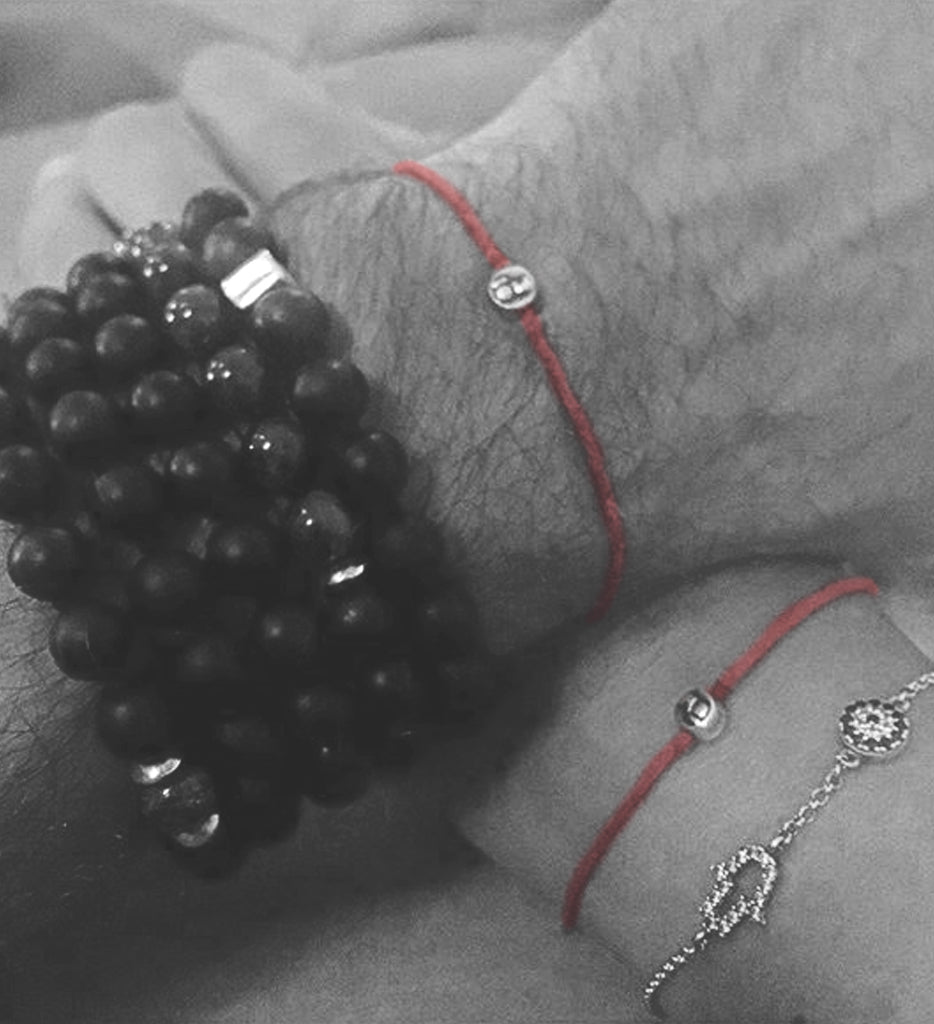 red string bracelets