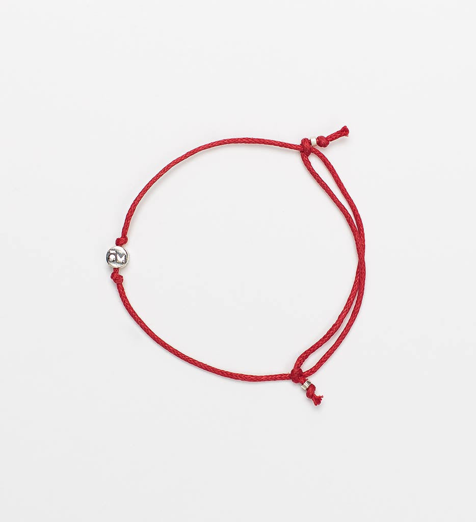 Modern Om Red String Bracelet Laydown