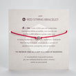 Load image into Gallery viewer, modern om red string bracelet front of packaging