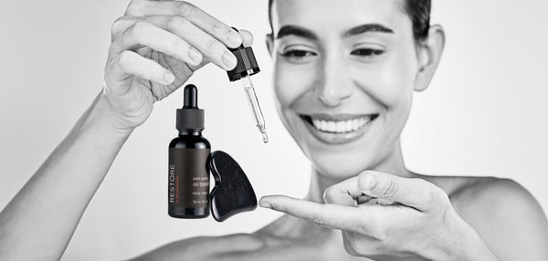 Body serum and skincare routine on desktop.